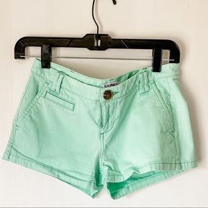 Express teal mini shorts